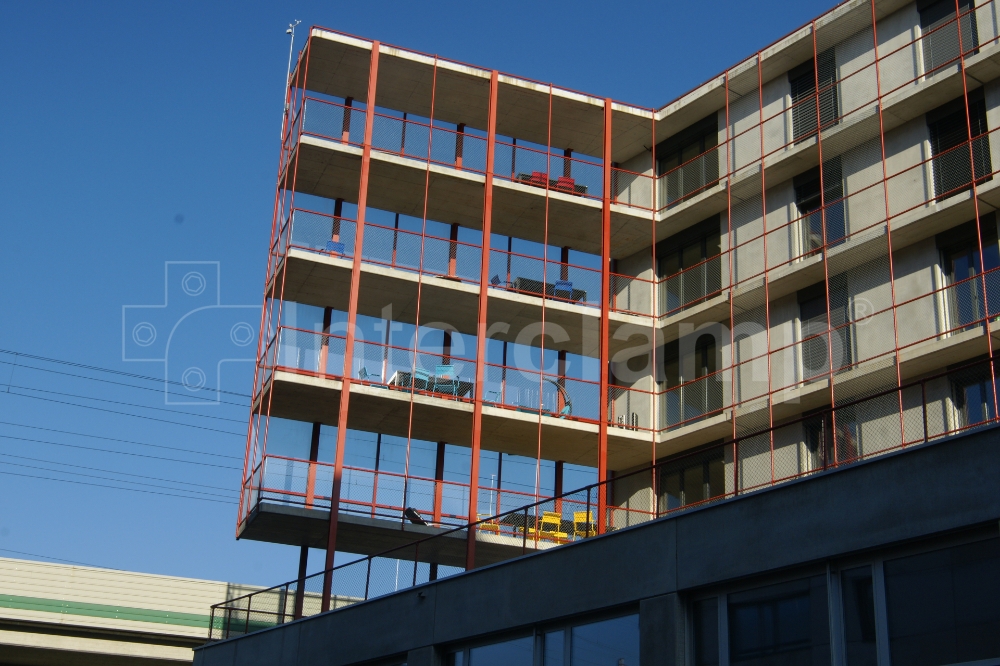 Durable balcony and walkway guardrails made with Interclamp tube clamp fittings at a student accommodation block in Switzerland, ensuring a safe living environment for students.